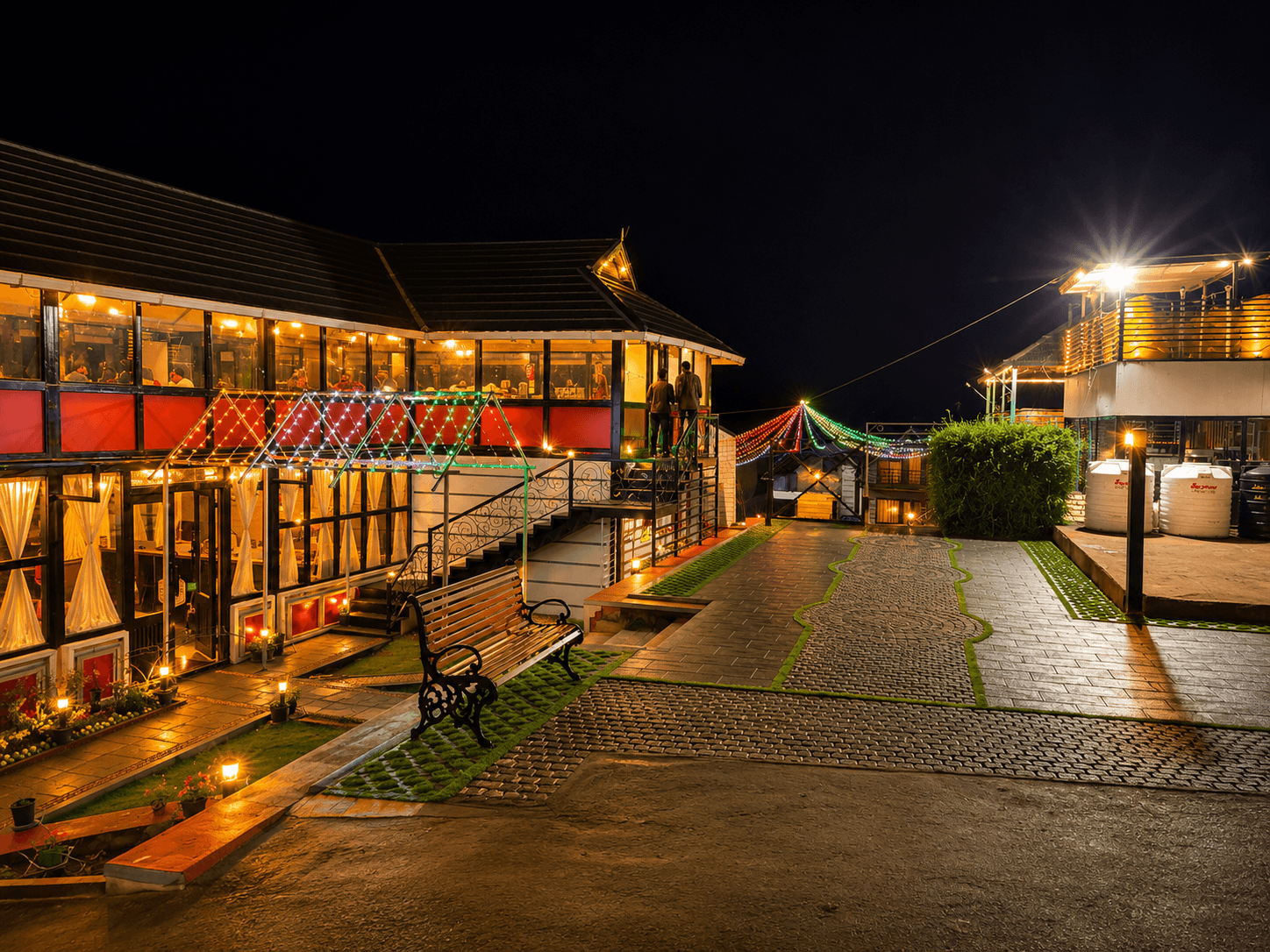 The Frame Resort grounds illuminated at night